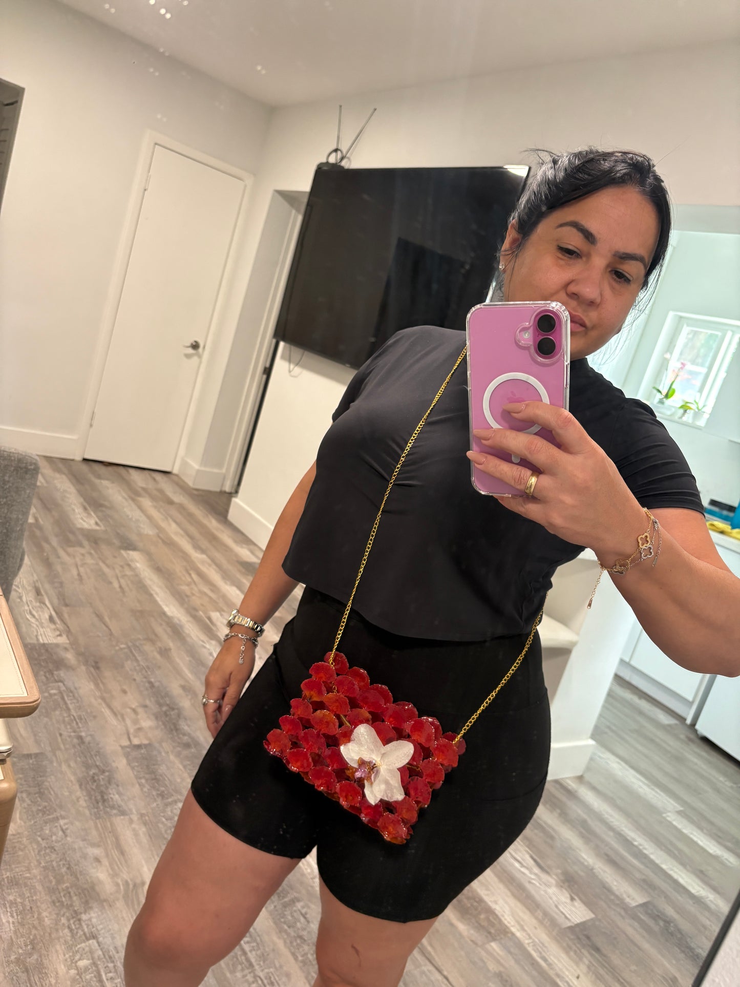 Bag of natural flowers & flamboyant and white orchid.