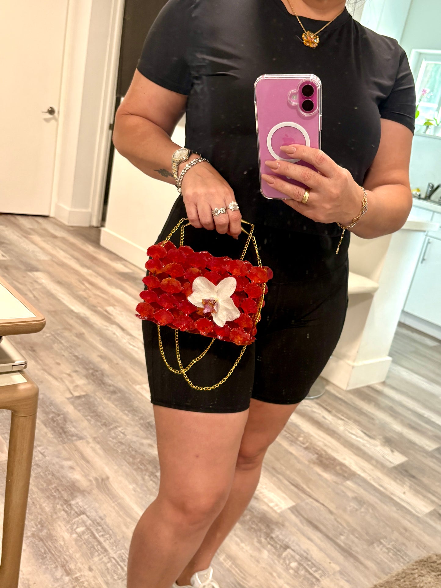 Bag of natural flowers & flamboyant and white orchid.