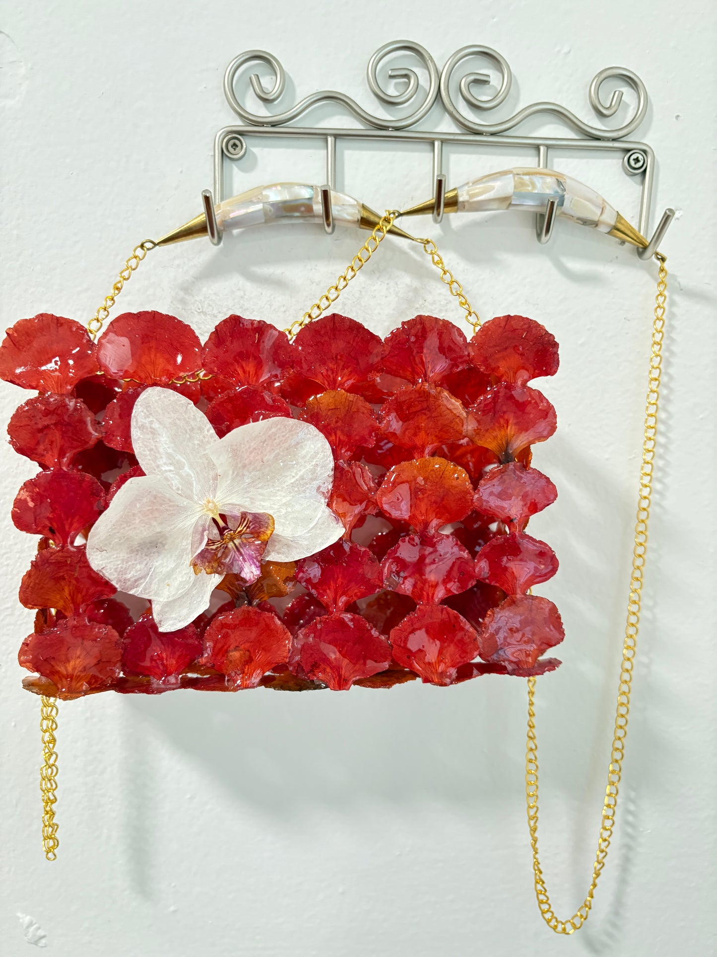 Bag of natural flowers & flamboyant and white orchid.